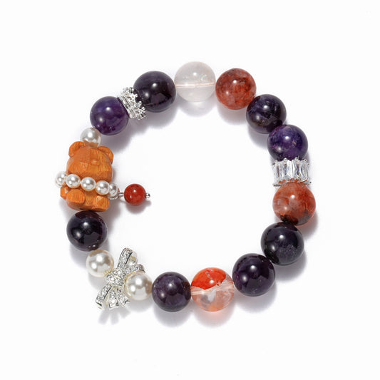 A fashionable energy bracelet with amethyst and red gelatin flowers