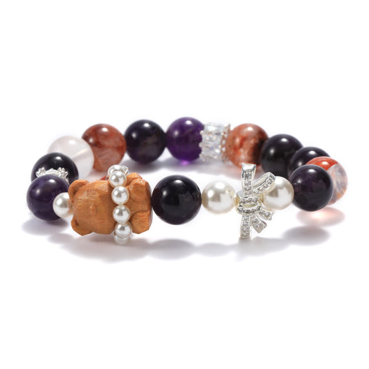A fashionable energy bracelet with amethyst and red gelatin flowers